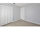 Bedroom features include wood-look floors and closet at 2742 Woodruff Dr, Orlando, FL 32837
