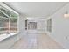 Enclosed patio view with white tiled floor at 2742 Woodruff Dr, Orlando, FL 32837