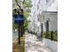 Exterior sidewalk and entrance to condo building, located downtown at 300 E South St # 6016, Orlando, FL 32801