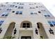 Condo building exterior, showing architectural details and multiple windows at 300 E South St # 6016, Orlando, FL 32801