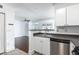 Bright kitchen featuring stainless steel appliances and a breakfast bar overlooking the living area at 300 E South St # 6016, Orlando, FL 32801