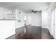 Spacious living room with hardwood floors and access to balcony at 300 E South St # 6016, Orlando, FL 32801