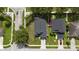 Birds-eye view of a home showcasing its roof, well-kept lawn, and proximity to neighborhood streets at 3101 Linton Rd, Kissimmee, FL 34758