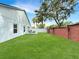 Spacious backyard featuring lush green grass and privacy fencing at 3101 Linton Rd, Kissimmee, FL 34758