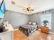 Inviting bedroom with neutral decor, hardwood floors, and a comfortable atmosphere at 3101 Linton Rd, Kissimmee, FL 34758