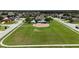 Well-manicured community with a playground, pool, and green space for outdoor activities at 3101 Linton Rd, Kissimmee, FL 34758