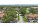 Scenic aerial view of the condominium community with lush landscaping and mature trees at 3118 S Semoran Blvd # 2, Orlando, FL 32822