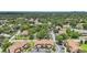 Scenic aerial view of the condominium community, showcasing lush trees and manicured landscaping at 3118 S Semoran Blvd # 2, Orlando, FL 32822