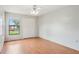 This bedroom has a ceiling fan, closet and views of the community at 3118 S Semoran Blvd # 2, Orlando, FL 32822