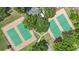 Birds eye view of community tennis courts offering a great space for outdoor recreation and exercise at 3118 S Semoran Blvd # 2, Orlando, FL 32822