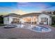Enjoy a relaxing evening by the pool and back patio with outdoor seating and landscaping at 3316 Regal Crest Dr, Longwood, FL 32779