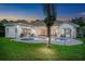 A pristine pool, surrounded by lush landscaping, offers a tranquil retreat at 3316 Regal Crest Dr, Longwood, FL 32779