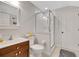 Well-lit bathroom showcases a glass enclosed shower and wood vanity at 3316 Regal Crest Dr, Longwood, FL 32779