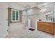 Bright bathroom features a glass shower, soaking tub, tile flooring and wood cabinets at 3316 Regal Crest Dr, Longwood, FL 32779