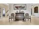 Grand foyer area with tile flooring, decorative chest, and wall art at 3316 Regal Crest Dr, Longwood, FL 32779