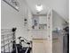 Utility room features white cabinets, tile floors, and modern appliances at 3316 Regal Crest Dr, Longwood, FL 32779