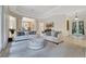 Spacious living room featuring tile floors, comfortable seating, and an inviting, open layout at 3316 Regal Crest Dr, Longwood, FL 32779