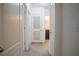 Hallway featuring doors leading to rooms and bathroom at 3569 Seneca Club Loop # 13, Orlando, FL 32808