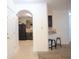 Bright living area features a breakfast bar overlooking a modern kitchen with stainless steel appliances at 3569 Seneca Club Loop # 13, Orlando, FL 32808