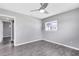 Comfortable bedroom with large windows and neutral gray walls at 4006 Kasper Dr, Orlando, FL 32806