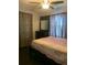 Bedroom featuring curtains, dresser, and a bed at 421 Ohio Ave, St Cloud, FL 34769