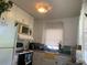 Functional kitchen with white cabinets, modern appliances, and a bright window at 421 Ohio Ave, St Cloud, FL 34769