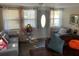 Comfortable living room with modern furniture, neutral tones, and plenty of natural light at 421 Ohio Ave, St Cloud, FL 34769