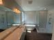 Bright Primary bathroom features a glass shower enclosure and a soaking tub at 441 Lady Palm St, Apopka, FL 32703
