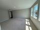 Unfurnished bedroom with natural light and neutral walls awaiting personalization at 441 Lady Palm St, Apopka, FL 32703