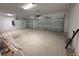 Spacious three-car garage with ample room for vehicles and storage at 441 Lady Palm St, Apopka, FL 32703