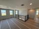 Spacious upstairs loft area featuring railing and many windows at 441 Lady Palm St, Apopka, FL 32703
