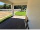 Covered brick patio perfect for enjoying the outdoor space with a view of the yard at 441 Lady Palm St, Apopka, FL 32703