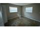Bedroom with neutral paint, hardwood floors, and natural light at 4732 Luce Rd, Lakeland, FL 33813