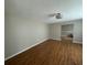 Open living room with hardwood floors and neutral paint at 4732 Luce Rd, Lakeland, FL 33813