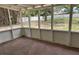 Enclosed patio with screens overlooking the lawn at 4732 Luce Rd, Lakeland, FL 33813