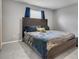 Comfortable bedroom with a large bed, soft carpet, and natural light, perfect for relaxation at 509 Cresting Oak Cir # 73, Orlando, FL 32824