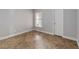 Neutral room featuring tile flooring, fresh paint, and ample natural light from the window at 5703 Arnold Zlotoff Dr, Orlando, FL 32821