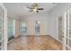 Bright sunroom with tiled floor, ceiling fan, and sliding doors at 5703 Arnold Zlotoff Dr, Orlando, FL 32821
