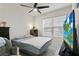 Inviting bedroom with a comfortable bed, nice decorations, and a modern television at 5808 Arboretum St, St Cloud, FL 34771