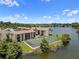 Exterior of the condo complex near the lake and tennis court at 614 Orange Dr # 196, Altamonte Springs, FL 32701
