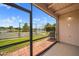 Enclosed patio with views of the tennis court and lake at 614 Orange Dr # 196, Altamonte Springs, FL 32701