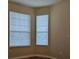 Bedroom boasts a window with blinds at 6214 Stevenson Dr # 208, Orlando, FL 32835