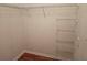 Walk-in closet with wire shelving for ample storage options at 6214 Stevenson Dr # 208, Orlando, FL 32835