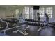 Community gym featuring various weights and machines in a bright space at 6214 Stevenson Dr # 208, Orlando, FL 32835