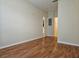 Spacious living room featuring hardwood floors and neutral paint at 6214 Stevenson Dr # 208, Orlando, FL 32835