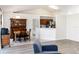 Bright dining area with a modern table and chairs, connected to the kitchen and living spaces at 630 Park Valley Cir, Minneola, FL 34715