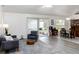 Spacious living area with sliding glass doors leading to the patio, creating a seamless indoor-outdoor flow at 630 Park Valley Cir, Minneola, FL 34715