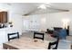Open living space with dining table and living room furniture, providing a versatile and comfortable layout at 630 Park Valley Cir, Minneola, FL 34715