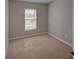 Neutral bedroom featuring carpeting and a bright window view at 7462 Bentonshire Ave, Windermere, FL 34786