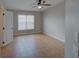 Bedroom with window and tile flooring at 7462 Bentonshire Ave, Windermere, FL 34786